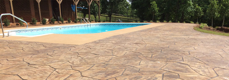 This image shows a Stamped Concrete pool deck.