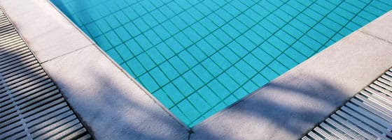 Stamped Concrete This image shows a pool deck that will be resurfaced.