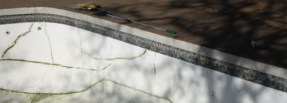 This image shows cracks in a pool area.